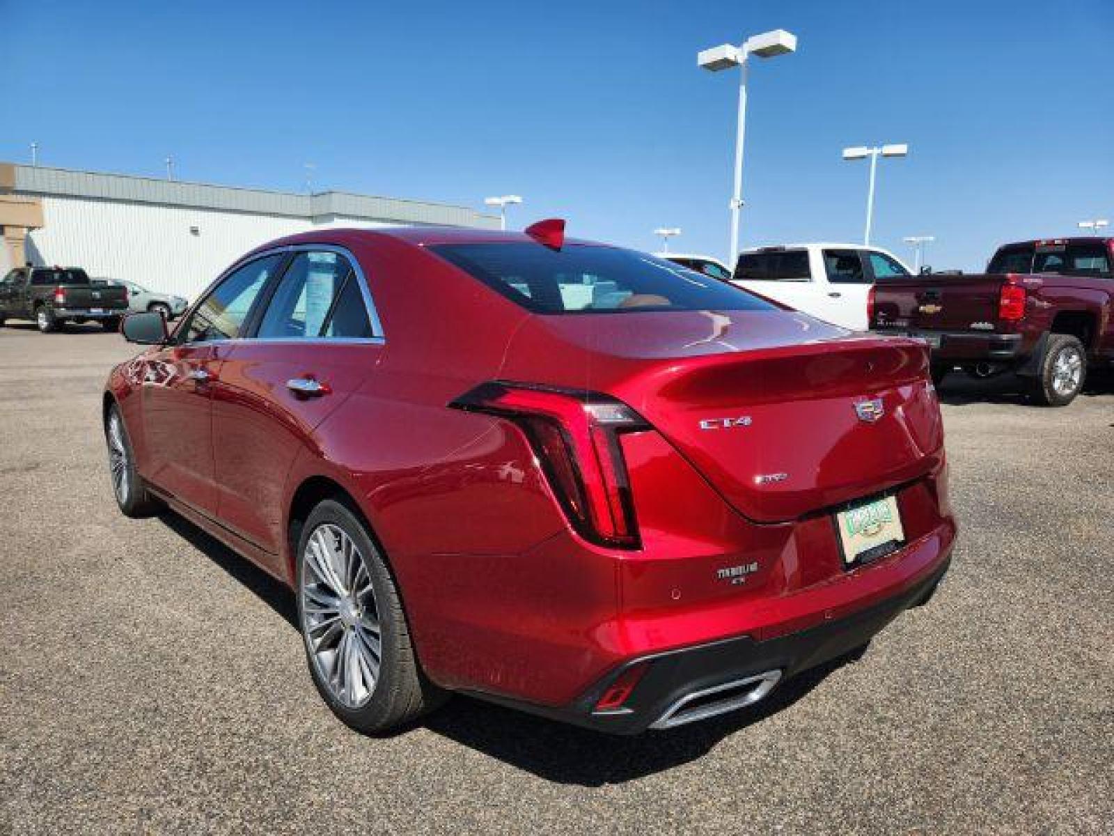 2022 Infrared Tintcoat /Cinnamon w/Jet Black Accents Cadillac CT4 Premium Luxury (1G6DF5RL7N0) with an 2.7L L4 DOHC 16V TURBO engine, 8-Speed Automatic transmission, located at 1235 N Woodruff Ave., Idaho Falls, 83401, (208) 523-1053, 43.507172, -112.000488 - Photo #3
