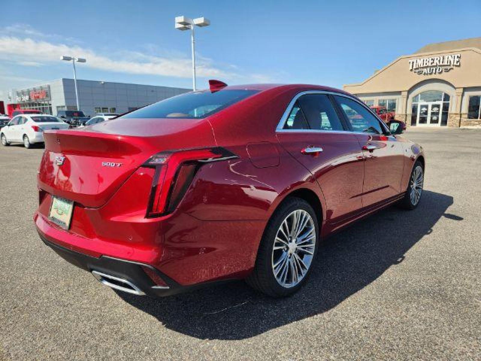 2022 Infrared Tintcoat /Cinnamon w/Jet Black Accents Cadillac CT4 Premium Luxury (1G6DF5RL7N0) with an 2.7L L4 DOHC 16V TURBO engine, 8-Speed Automatic transmission, located at 1235 N Woodruff Ave., Idaho Falls, 83401, (208) 523-1053, 43.507172, -112.000488 - Photo #5