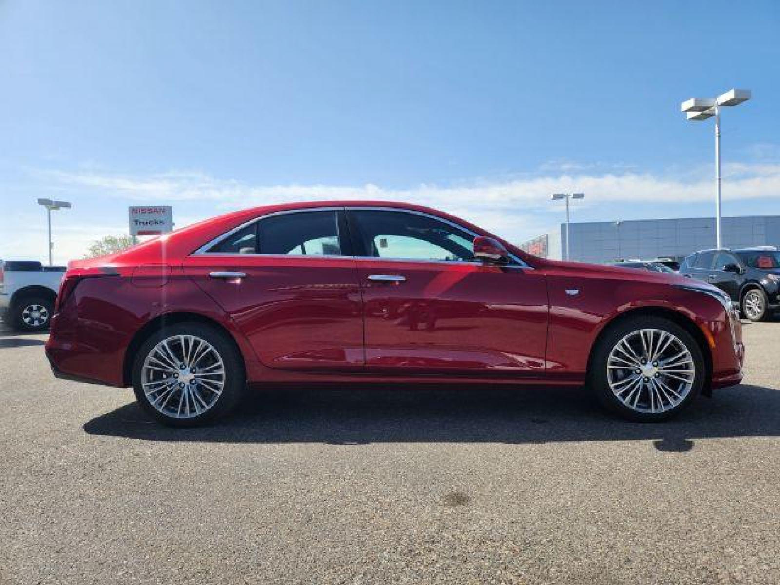 2022 Infrared Tintcoat /Cinnamon w/Jet Black Accents Cadillac CT4 Premium Luxury (1G6DF5RL7N0) with an 2.7L L4 DOHC 16V TURBO engine, 8-Speed Automatic transmission, located at 1235 N Woodruff Ave., Idaho Falls, 83401, (208) 523-1053, 43.507172, -112.000488 - Photo #6